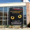 Wechselbanner mit Fassadenlift, Konzept und Realisierung